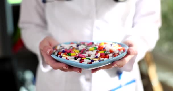 Doctor Holds Plate Different Medical Pills Consequences Uncontrolled Use Drugs — Stockvideo