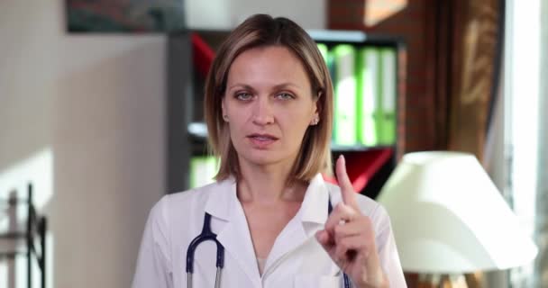 Woman Doctor Pointing Finger Gesture Paying Attention Medical Examination Insurance — Stock video