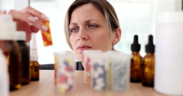 Woman Choosing Jars Medicines Shelf Pharmacy Movie Slow Motion Pharmaceutical — Stock Video