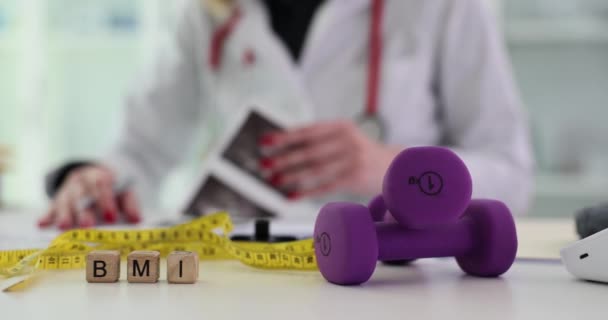 Cube Inscription Bmi Dumbbells Measuring Tape Medical Concept Diet Health — Stock Video