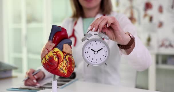 Cardiologist Doctor Holding Heart Alarm Clock Cardiology Heart Time Treatment — Vídeo de Stock