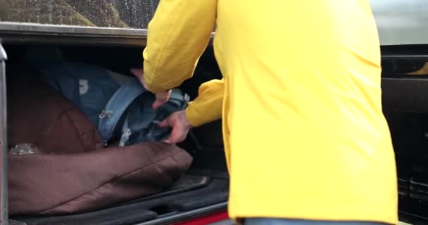 Man Putting Things Car Closing Trunk Closeup Movie Slow Motion — Stock Video