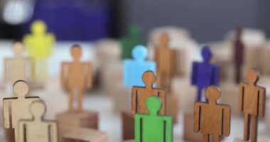 Multicolored figures of people in crowd. Analysis and competition for interrelated relationships