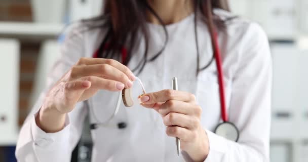 Ent Doctor Holds Hearing Aid Hands Hearing Impairment Concept — Αρχείο Βίντεο