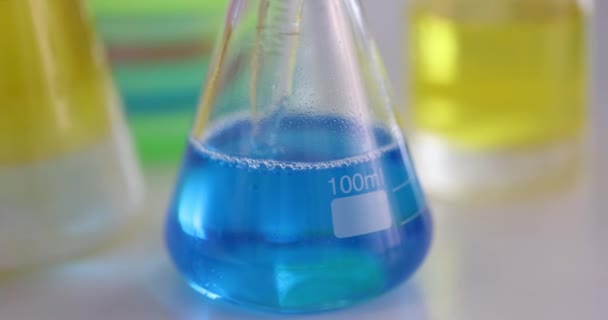 Sample Blue Liquid Taken Flask Pipette Chemical Research Concept — Video Stock