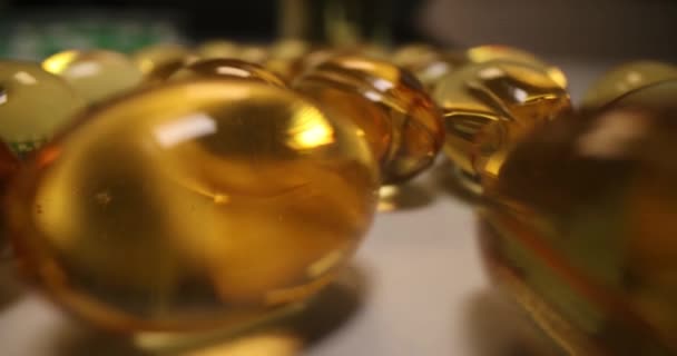 Fish Oil Capsules Yellow Oil Omega Vitamin Fatty Acid Benefits — Video Stock