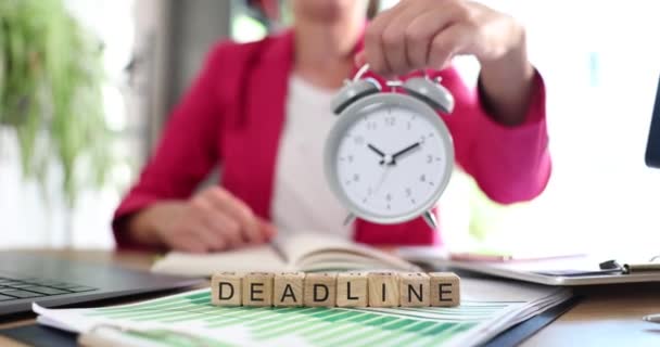 Hand Business Woman Holds Out Hand Alarm Clock Text Deadline — Stock Video