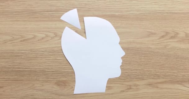 脳の形をした白いパズル 脳のパズルと精神衛生と記憶の問題の欠片 — ストック動画