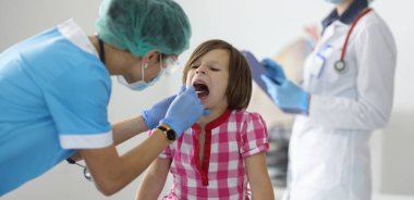Close-up of female nurse, takes cotton bud to analyze saliva, nasal swab, mucous membrane for DNA tests. COVID-19, determination paternity or presence of virus
