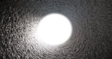 Dark gray tunnel with light end. Sewerage and pipes concept