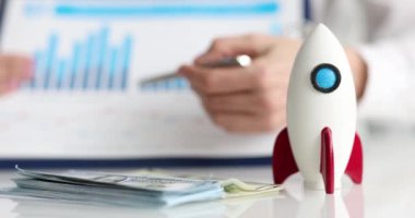 Business financial chart and rocket for startup startup. Successful profitable business concept