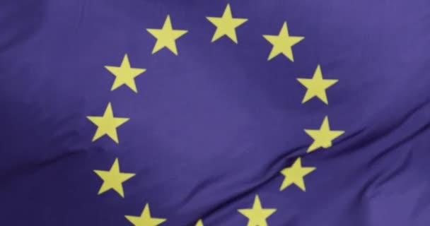 Drapeau de l'Union européenne orné d'un cercle de douze étoiles d'or ondulées gracieusement. Drapeau de l'Europe affichant le symbole de l'unité entre les diverses nations