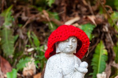 Hiroshima, Japan - January 2, 2020. Close-up of a statue at the famour Mitaki Dera Temple in Hiroshima Japan.