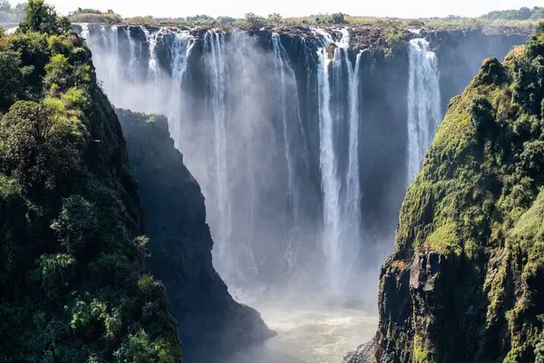 stock image Victoria Falls, as seen from the Victoria Falls Bridge, connecting Zimbabwe and Zambia