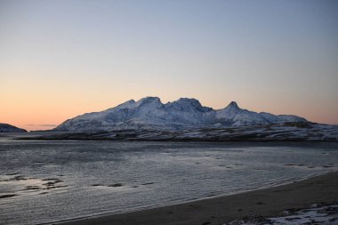 Detail of the rugged mountains near Bodo, in arctic norway, during golden hour.