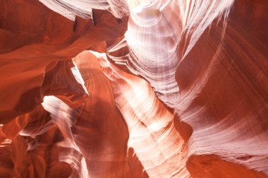 Antelope Canyon. A breathtaking slot canyon in Arizona, Antelope Canyon features winding, narrow passages with stunning, swirling sandstone formations. Known for its ethereal light beams and vibrant clipart