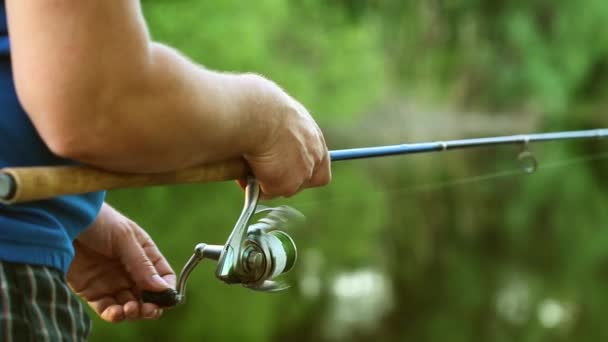 Close Fisherman Hands Spinning — Stock Video