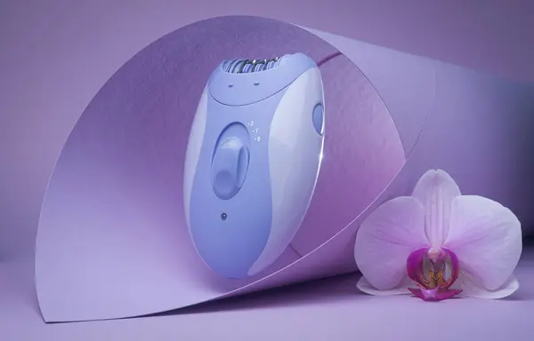 Epilator Purple Background Skin Care Removal Unwanted Hair Stock Image