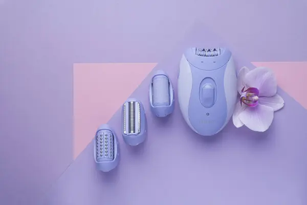 Top View Epilator Purple Background Skin Care Removal Unwanted Hair Stock Picture