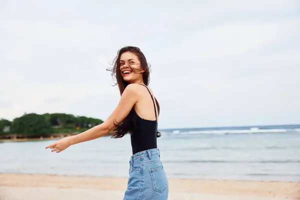 long woman nature relax running hair lifestyle sea sunset summer happiness ocean person young beach carefree smile vacation water space copy activity travel