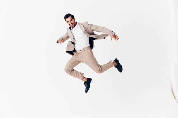 model man job business smile isolated occupation idea professional suit fashion smiling shirt flying happy adult running businessman winner victory beige