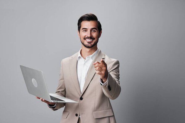 model man internet computer copyspace person manager technology typing job freelancer background professional business guy network handsome shirt smiling laptop office suit
