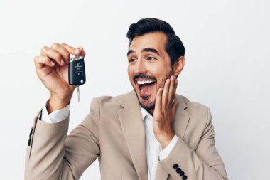 Kilitleyen adam düğmesi servis arabası yeni otomatik adam arka plan bej müşteri satın aldı klavye satın aldı araç işi sahibi anahtar gülümseme