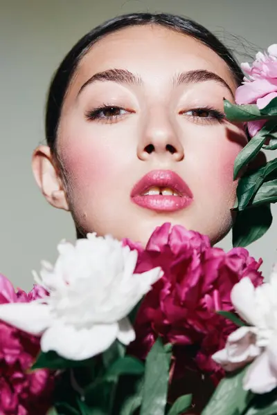 woman blush pink face style bouquet skin cosmetic flower make-up model romantic girl portrait lip closeup cosmetology beauty femininity young makeup