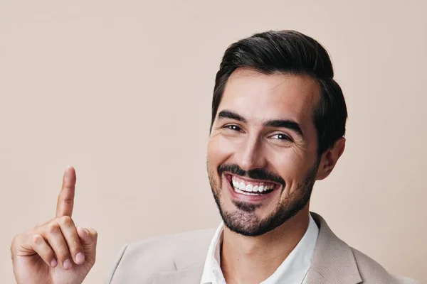 man white victory studio arm suit winner businessman happy beige formal celebrate hand smiling isolated person cheerful stylish business smile copyspace