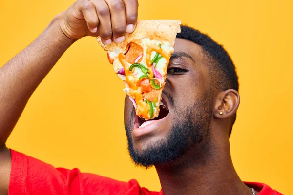 man person red funny millennial guy background male delivery habit fast hold food concept happy black slice bearded overeating pizza food smile lifestyle