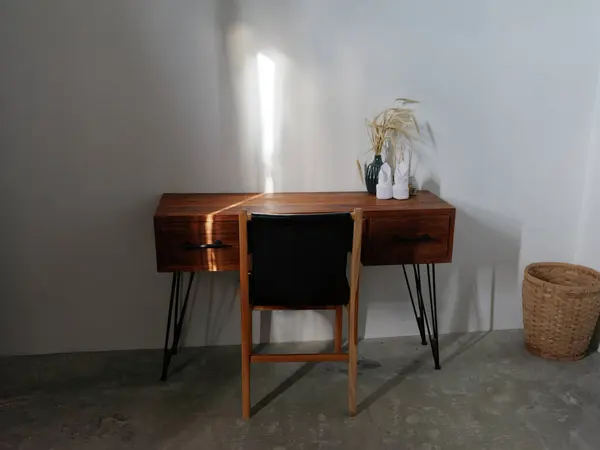Modern decor on wooden dresser table, stylish interior, concrete elements. High quality photo