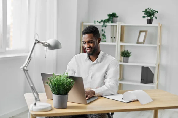 man desk online programmer chat using laptop freelancer employee manager african computer workplace worker black entrepreneur student job education office distance american