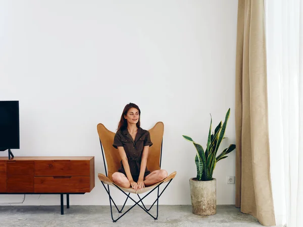 Woman Sitting Leather Armchair Window Smiling Modern Stylish Interior Scandinavian — Stock Photo, Image