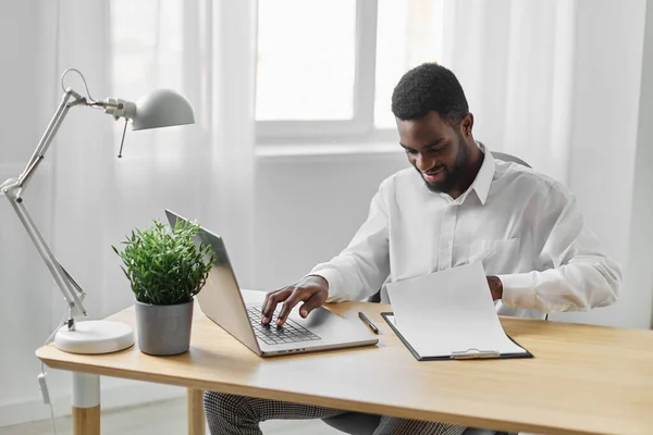 stock image man space laptop technology office worker freelance computer african conference freelancer online job education student american call programmer indoor employee copy black home