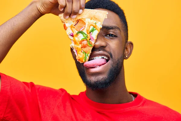 man space yellow guy food male pizzeria happy delivery enjoy hungry copy background fast food unhealthy person eat black smile online funny millennial pizza