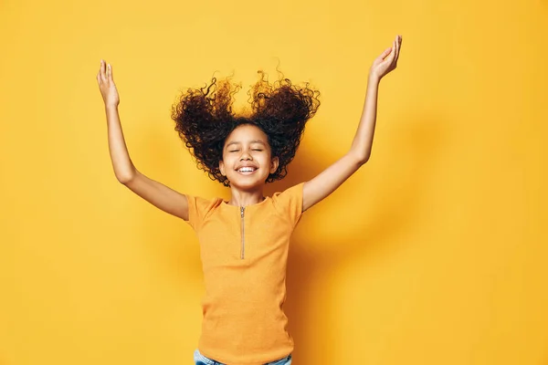 Beauty joyful girl person black little childhood young cute happiness fun expression happy smile female yellow cheerful girl portrait excited background afro children background