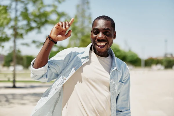 Man young adult happy black male smile background guy gesture handsome african isolated confident sign looking afro american portrait lifestyle face hand cheerful person