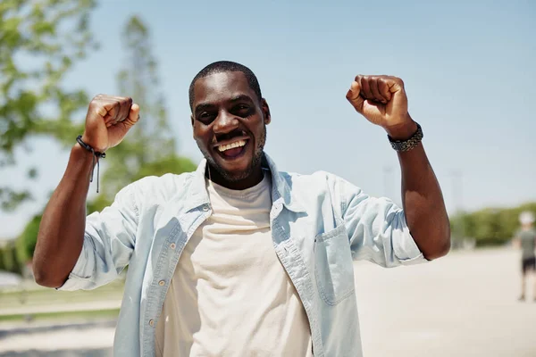 American man attractive happiness person adult smile portrait young happy cheerful black african expression face male guy positive looking handsome success lifestyle