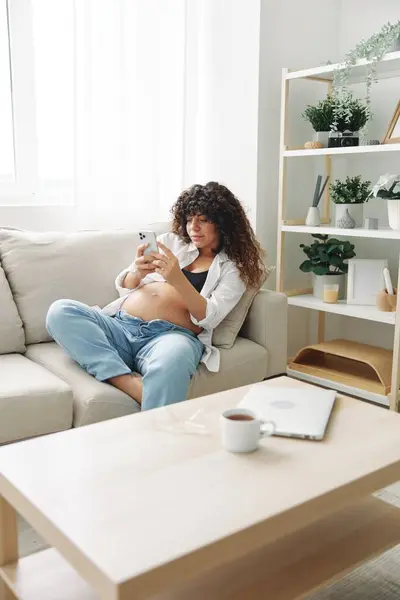 Pregnant Woman Blogger Sits Couch Home Takes Pictures Herself Phone — Stock Photo, Image