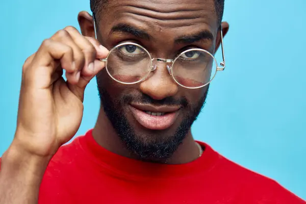 clothing man black accessory african person american background glasses stylish copy style coiffure space blue portrait fashion model elegant beauty smile fashionable indoor