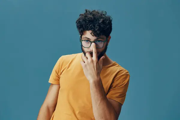 Guy man pensive emotion cool background person attractive young casual portrait looking expression handsome studio wall isolated face gesture standing adult