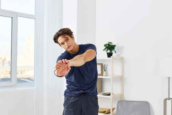 activity man health indoor healthy training body lifestyle exercise stretching adult hobby yoga physical male home exercising apartment fitness sport active house
