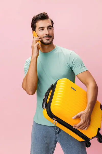 Man service tourist mobile guy journey phone studio smartphone adult traveler passenger travel hotel smile white vacation suitcase baggage airport