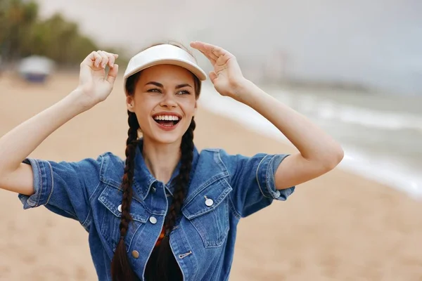 Happy Female: Attractive Portrait of a Young Caucasian Woman with Pretty Hair and a Summer Hat, Smiling on a White Background in Nature
