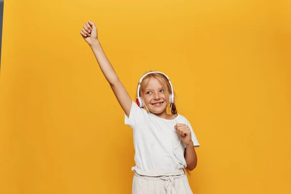 Young Woman Celebrating Success Yellow Background — Stock Photo, Image