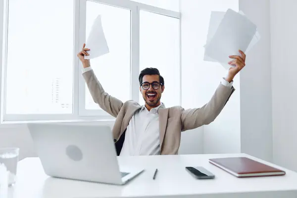 Planning man white happy laptop expertise winner shirt success company professional employee businessman document successful holding suit paper office modern caucasian concept smiling