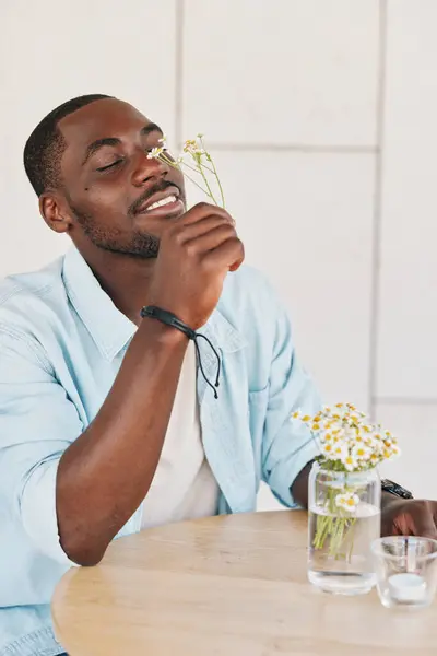 Casual man attractive male modern guy happy happiness lifestyle sitting smile phone young adult american black mobile looking portrait handsome afro african cheerful person