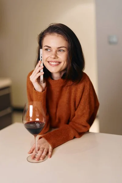 Cheerful Lady Enjoying Wine at a Luxury Cafe, Captured in a Joyful Portrait