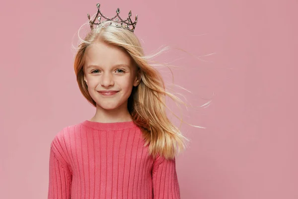 Happy Birthday Princess Party Cute, joyful little girl in a pink princess dress, wearing a crown, surrounded by balloons and gifts With a background full of magic and fantasy, she holds a smile of
