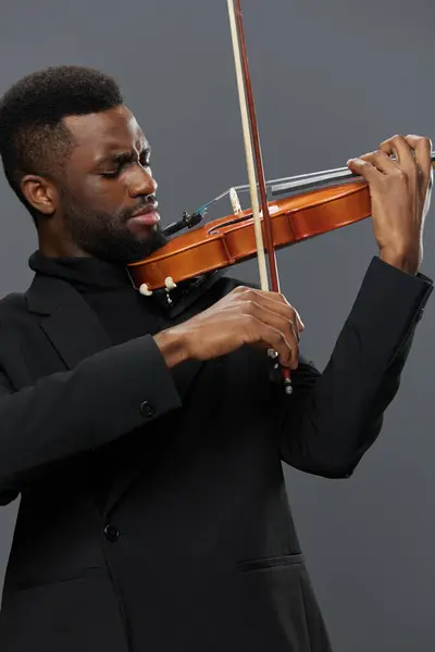 Soulful African American Man Black Suit Playing Violin Gray Background — Stock Photo, Image